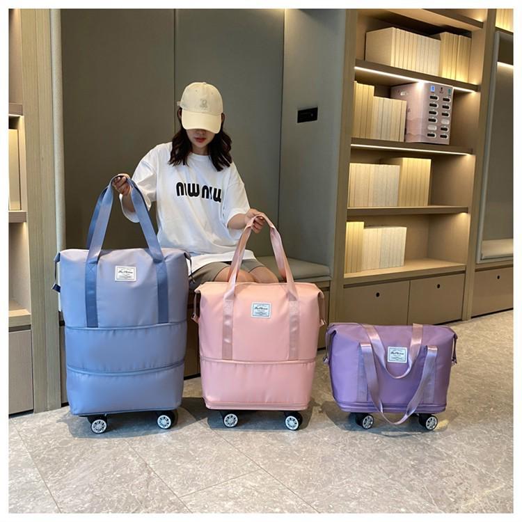 Extra-Large Expandable Travel Duffel with Wheels: Wet/Dry Separation, Lightweight & Practical for Prenatal Storage & Business Trips.