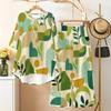 Women Plus Size Round Neck Three Quarter Sleeve Geometric Printed High Low Top And Long Pants Two Piece Set