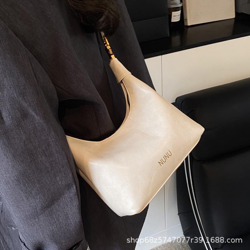 Retro Large-capacity Cloud Bag Casual and Simple 2025 Spring New Solid Color Fashionable Portable Messenger Dumpling Bag Woman