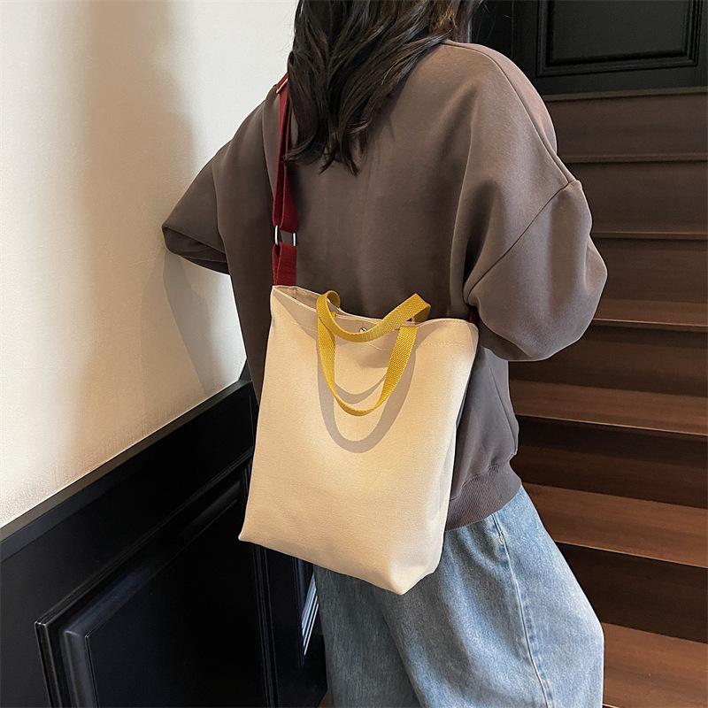 Simple canvas bag, men's and women's tide large-capacity portable shoulder bag, casual student class messenger bag