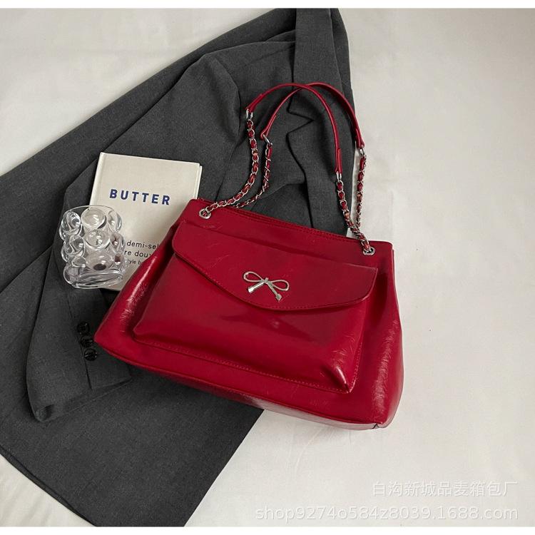 

Tote bag women s 2025 new large-capacity fashion commuter versatile shoulder bag Korean version of foreign style versatile messenger bag tide бордовий