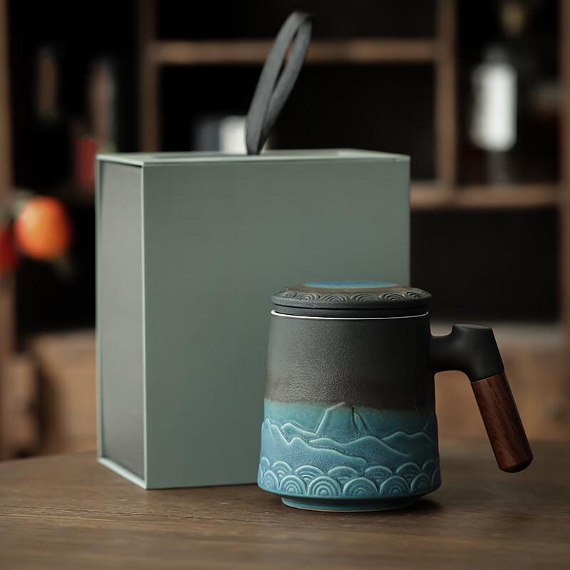 

Ceramic Tea Infuser Mug with Gradient Blue Design