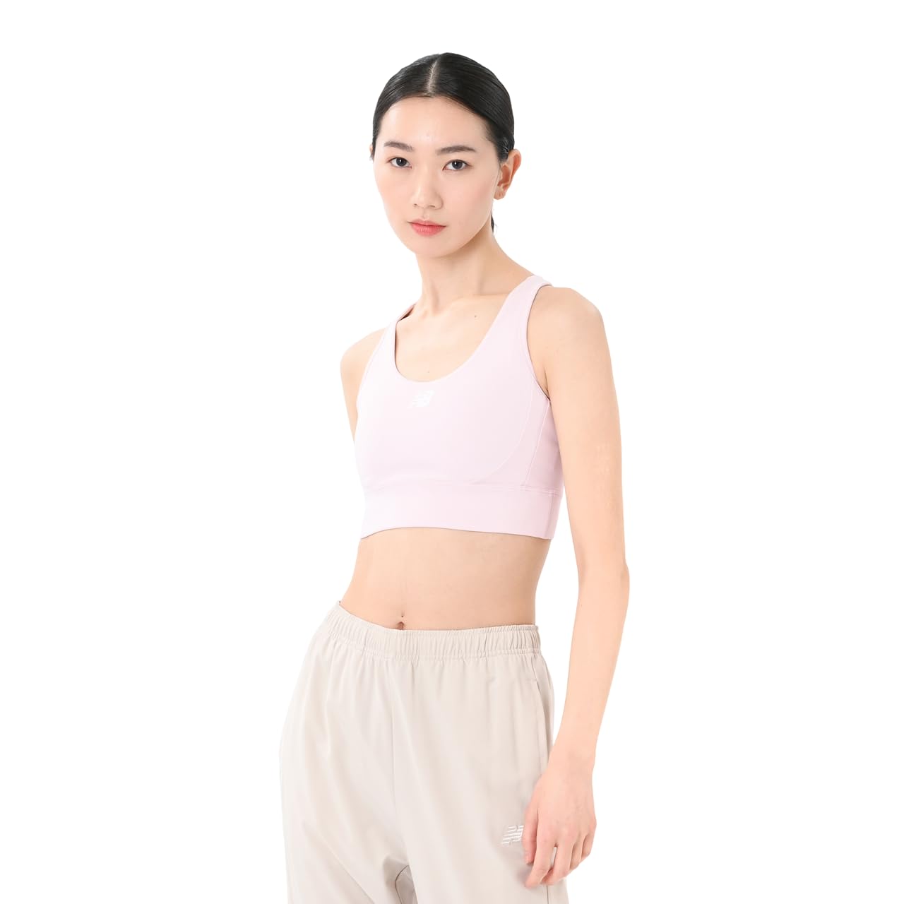 

Спортивный бюстгальтер New Balance Utility Graphic в цвете Rose Sugar женский (WB51468) (RSG)