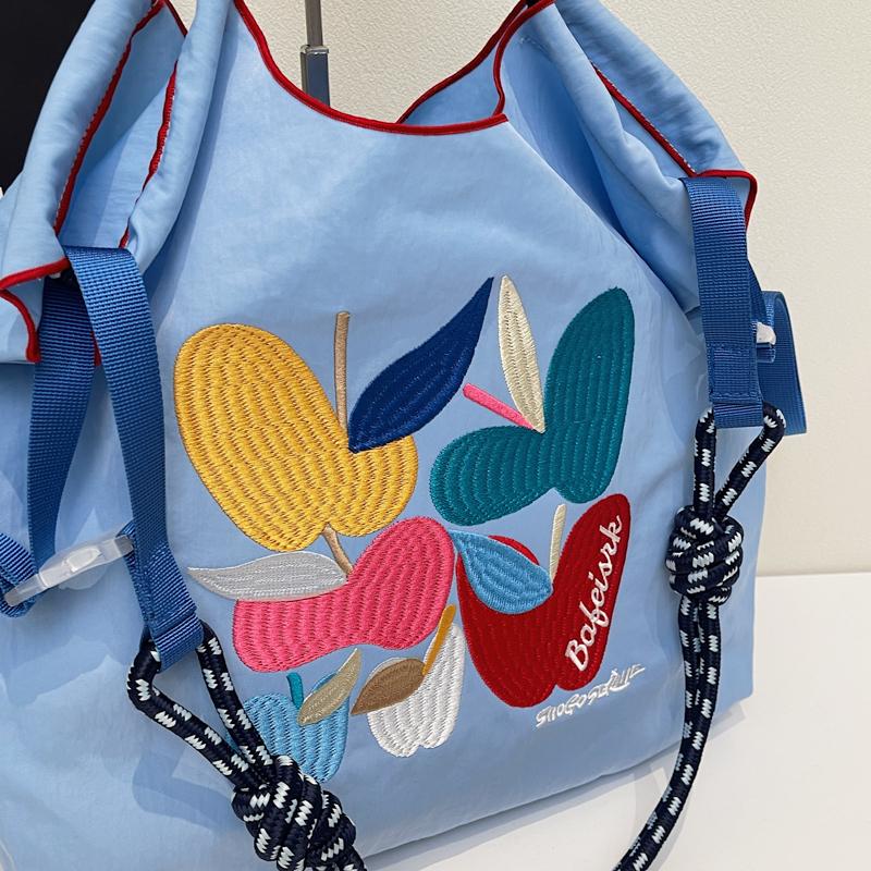 Ny damväska Lazy Ins Wind Japansk broderi Mode Joker Stor kapacitet Slitstark axelväska Pendlarbudväska.