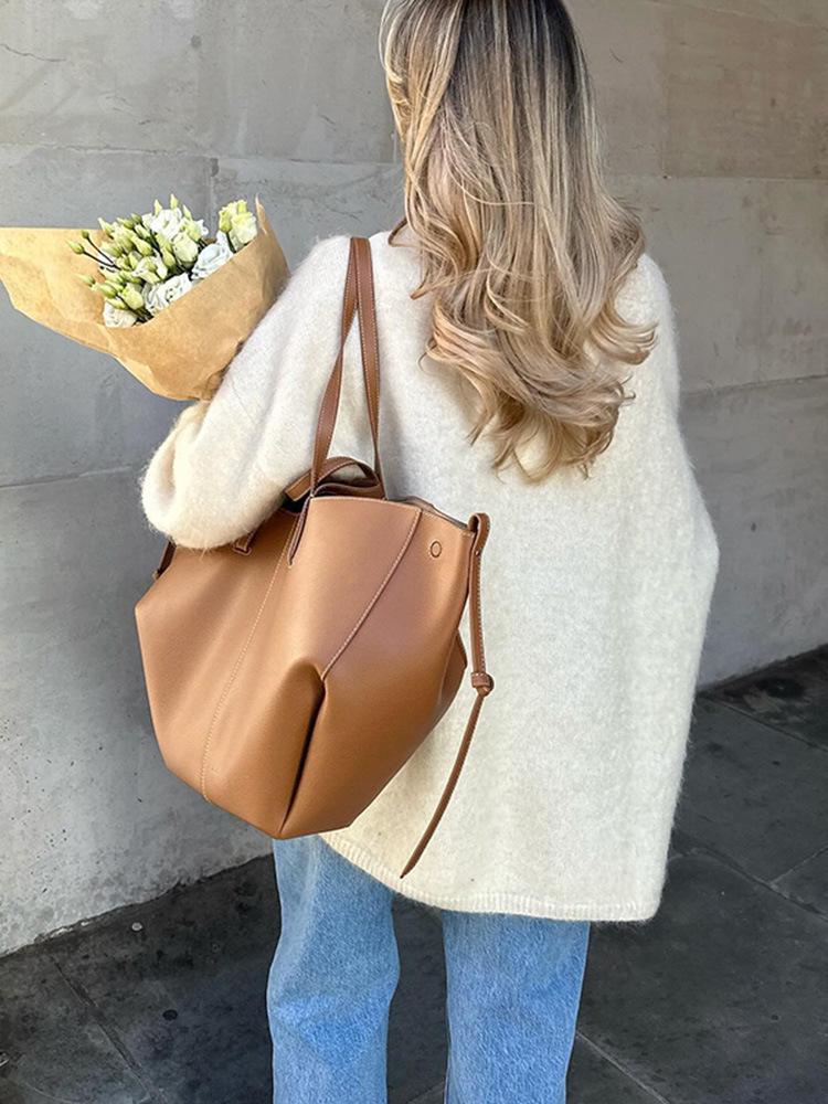 New Women's Loose Round Neck Plush Sweater: European & American Autumn/Winter Collection – Cozy, Solid Color Knit Outerwear, Lazy Style.