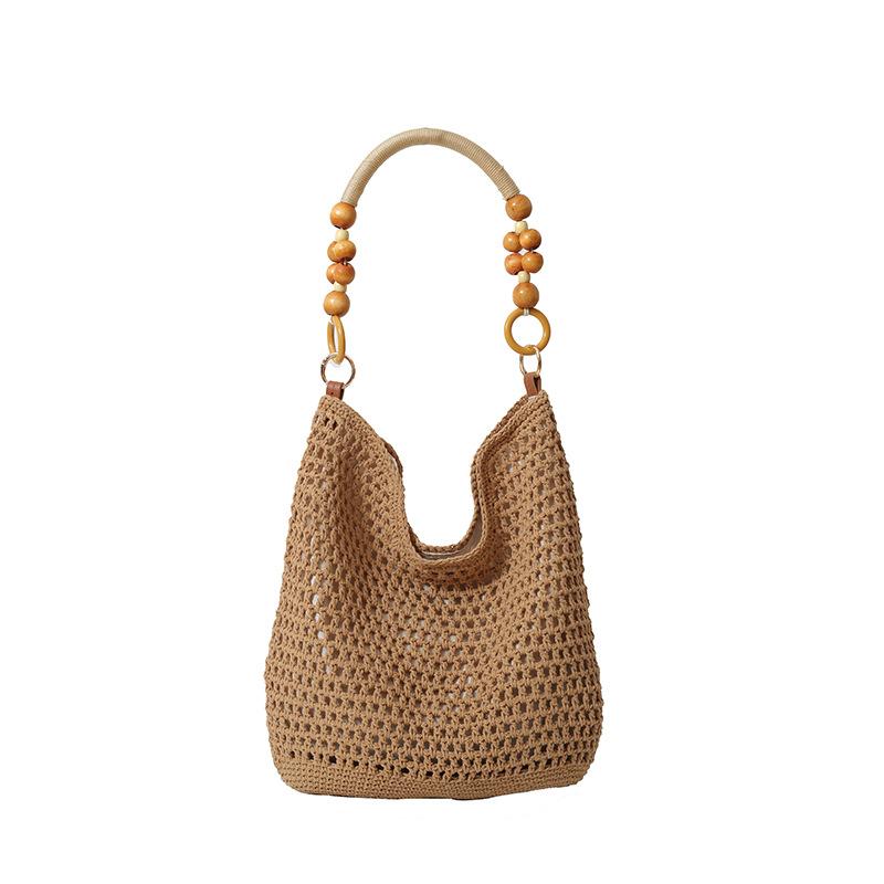 Stylish large-capacity knitted hollow women's tote bag, new exquisite beach vacation hand-woven shoulder bag