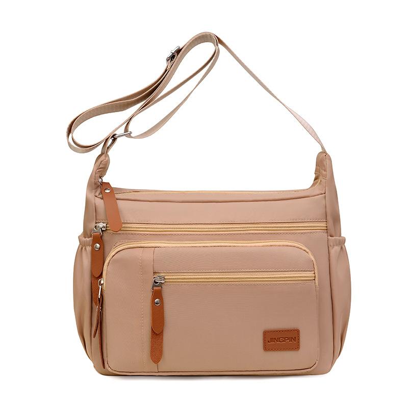 

Корейская версия модной водонепроницаемой сумки через плечо из ткани Оксфорд, новая женская повседневная сумка через плечо, сумка большой вместимости, холщовая сумка 26x31x10cm кофейный