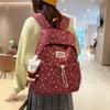 Cute Star Print Nylon Backpack for Women – Fashionable School & Daily Use Bag with Front Drawstring Pocket and Plush Charm