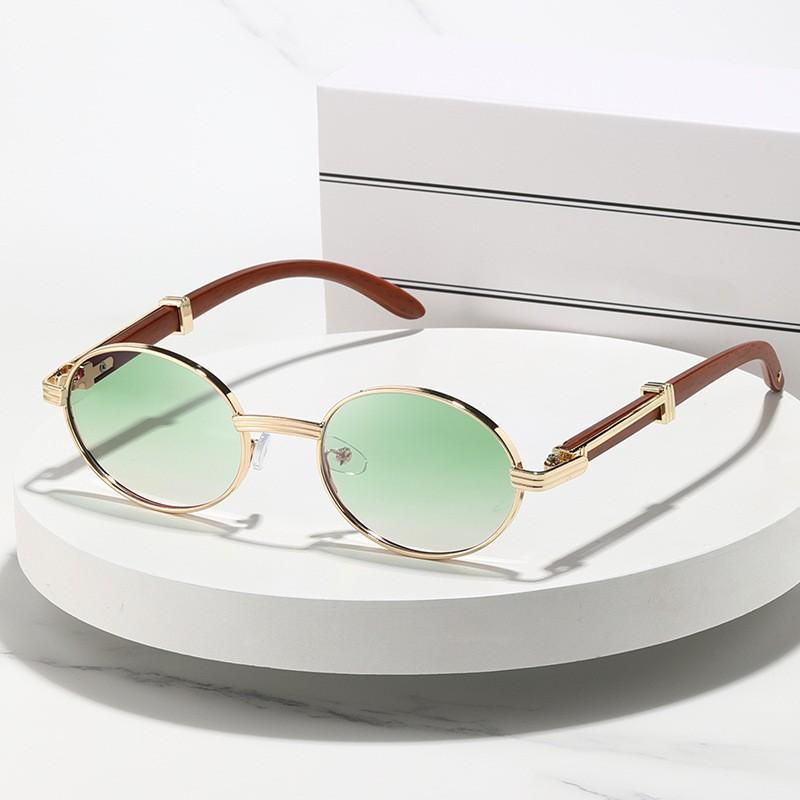 Fashion European and American sunglasses new women's oval frame metal glasses advanced sense Internet celebrity sunshades