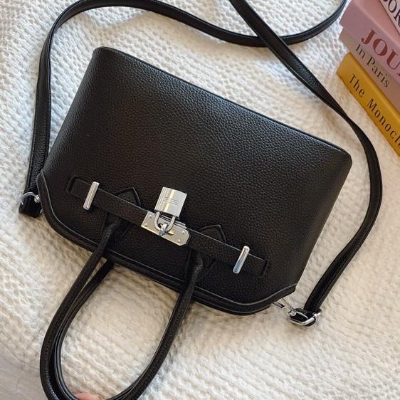 2025 new women's lychee pattern solid color lock shoulder bag temperament niche versatile commuter portable messenger