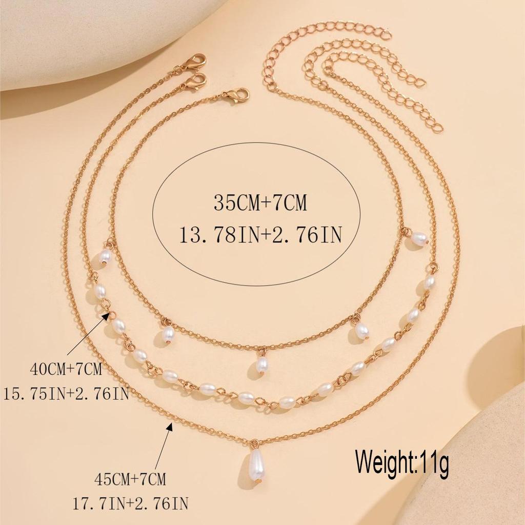 Multi-layer Pearl Pendant Necklace: European & American Design, Niche, Three-layer Clavicle Chain, Versatile for Women, Ideal for Vacation