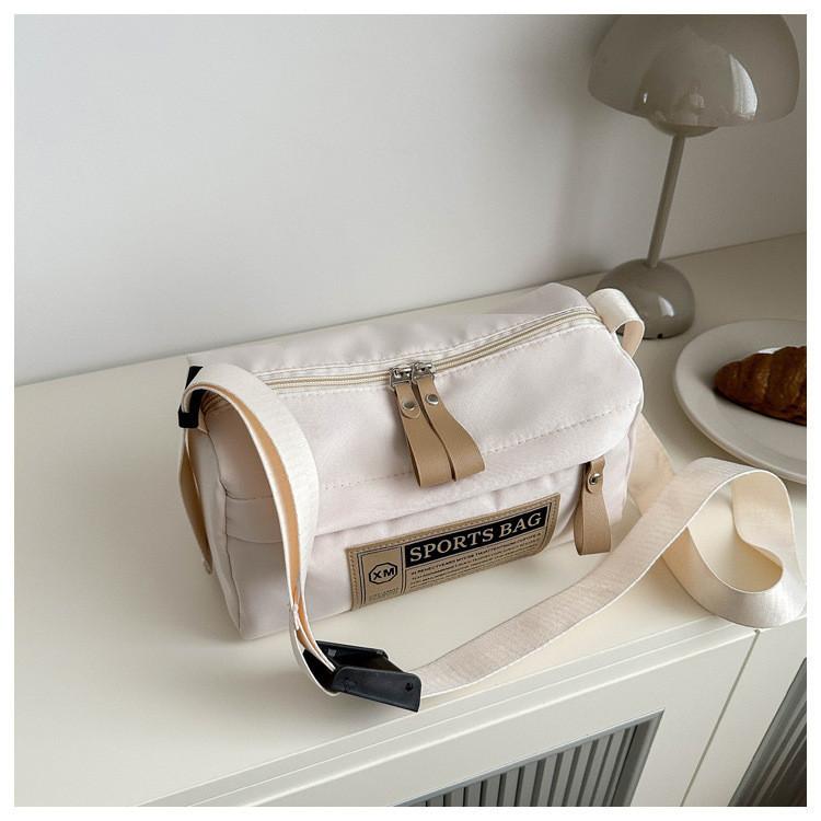 Stilvolle Oxford-Stoff Runde Fass-Tasche für Damen Trendige Lässige Umhängetasche