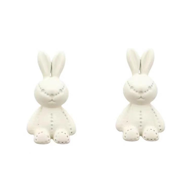 Cute Japanese and Korean white rabbit earrings female niche unique sweet stud earrings earrings New Year's trendy and small face