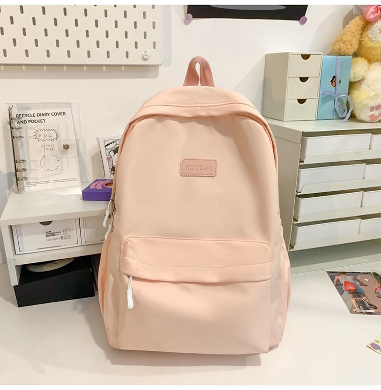 Schoolbag Japanese simple backpack large capacity high sense casual backpack male multi-function solid color female college student schoolbag tide