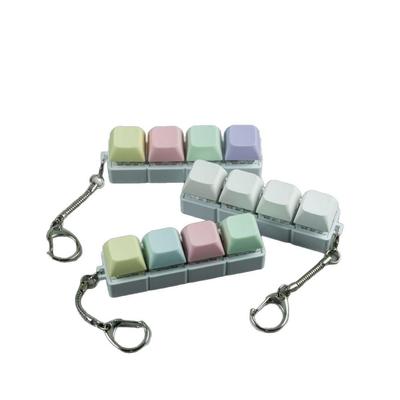 Multi-Color Macaron Keychain: Four-Button Decompression Toy & One-Time Switch Tester
