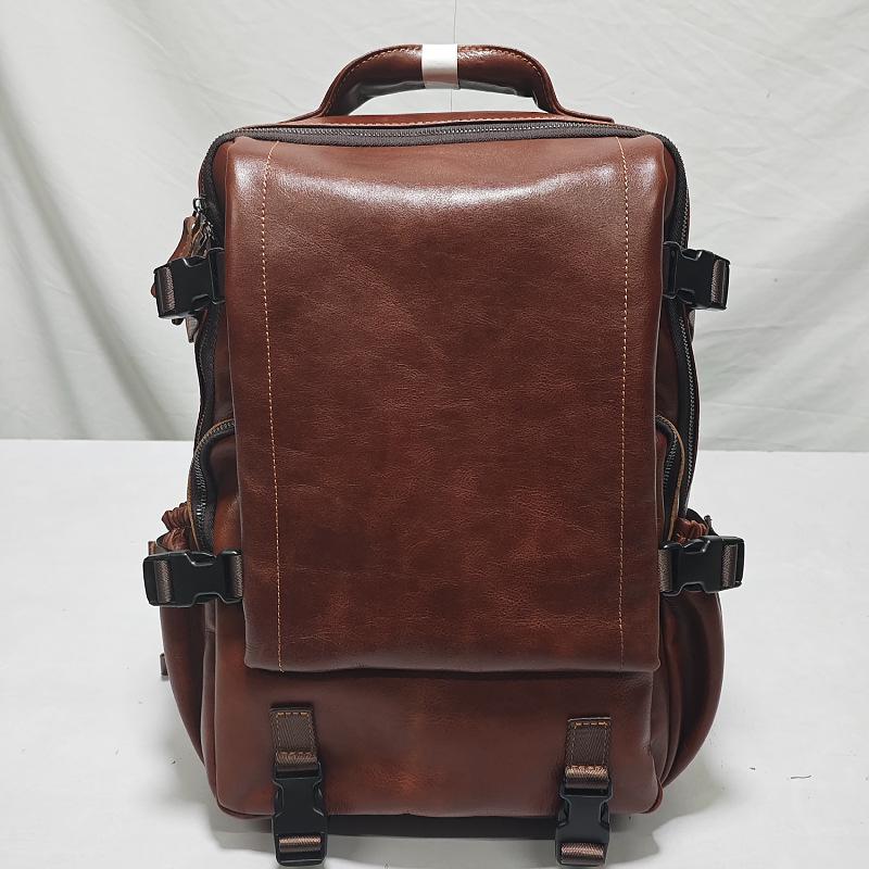 "Large Retro Cowhide Leather Backpack for Men and Women - Trendy Outdoor Travel and Business Laptop Bag with Ample Space"