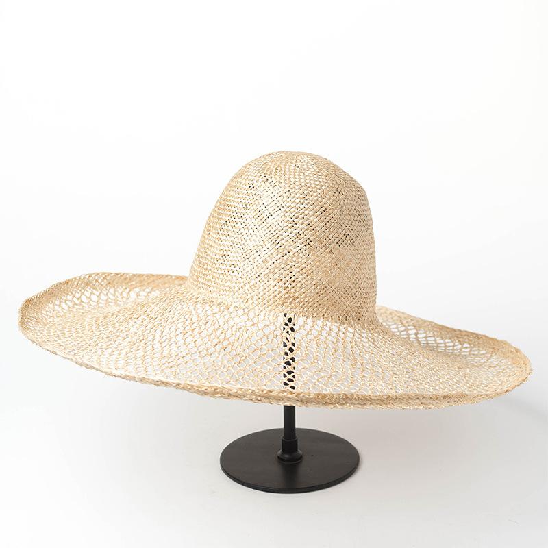 European and American Spring and Summer New Hollow Woven Sisal Dome Big Brim Straw Hat Women's Sun Hat Outdoor Sun Protection Beach Hat
