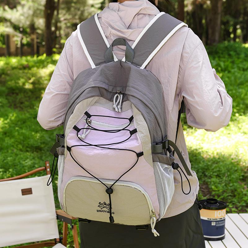 Schoolbag outdoor travel contrasting color backpack men's and women's new light hiking bag large capacity student bag