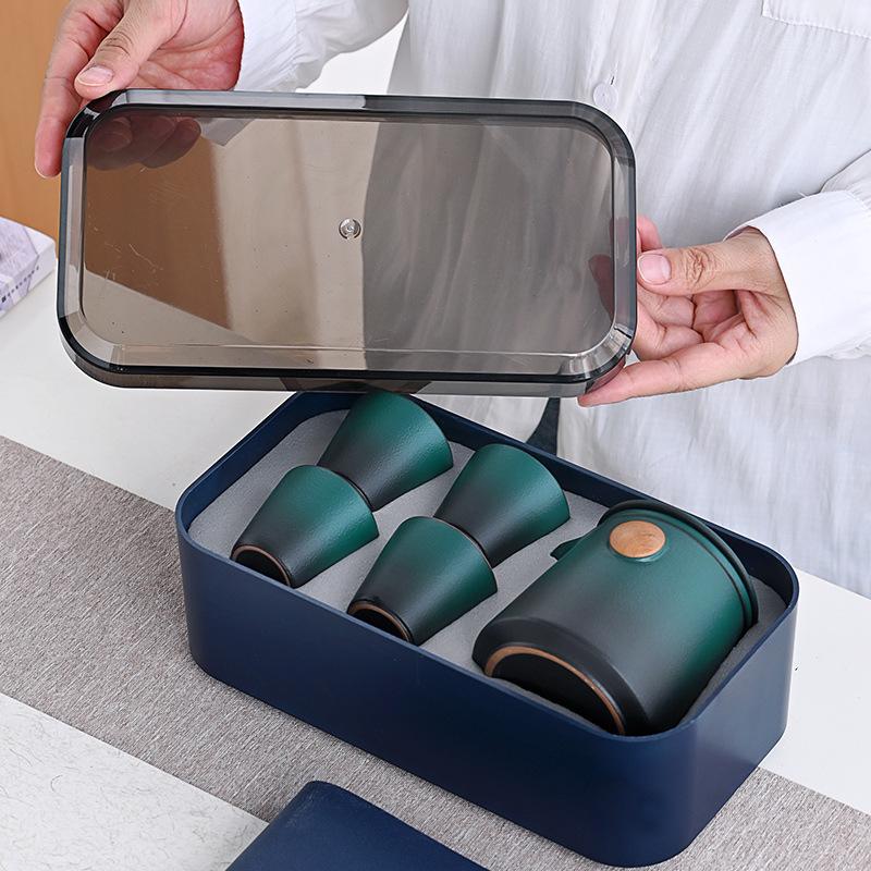 

Travel tea set for elders to meet, one pot of portable ceramics, two cups of small business gifts, express cup