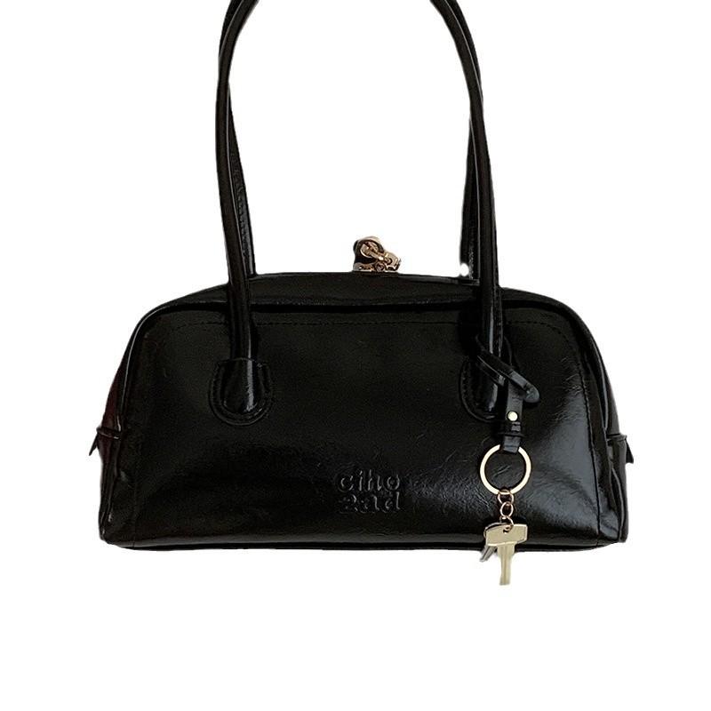 Niche texture portable commuter bowling bag bag women's 2025 new fashion retro underarm bag versatile shoulder bag