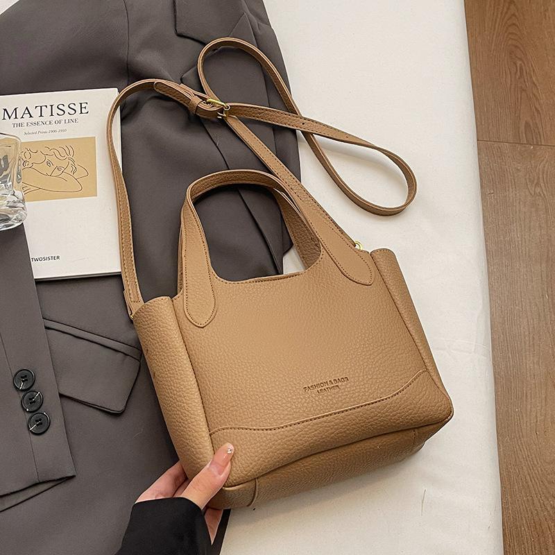 Wholesale Popular Korean Simple and Versatile Commuter Portable Bucket Bag Women's Fashion Lychee Pattern Texture Solid Color Messenger Bag