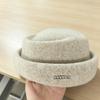 Knitted hat Flat top hat Women's autumn and winter versatile face small metal label retro simple casual hat