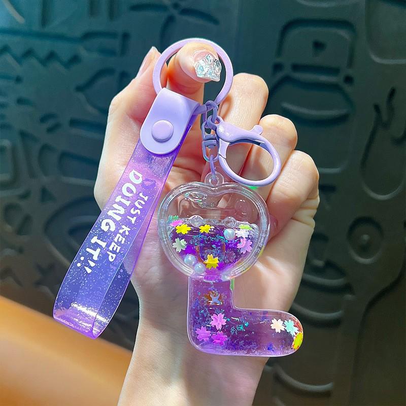 Exquisite Quicksand Panda Keychain: Cartoon Oil-Filled Doll Bag Pendant and Car Accessory