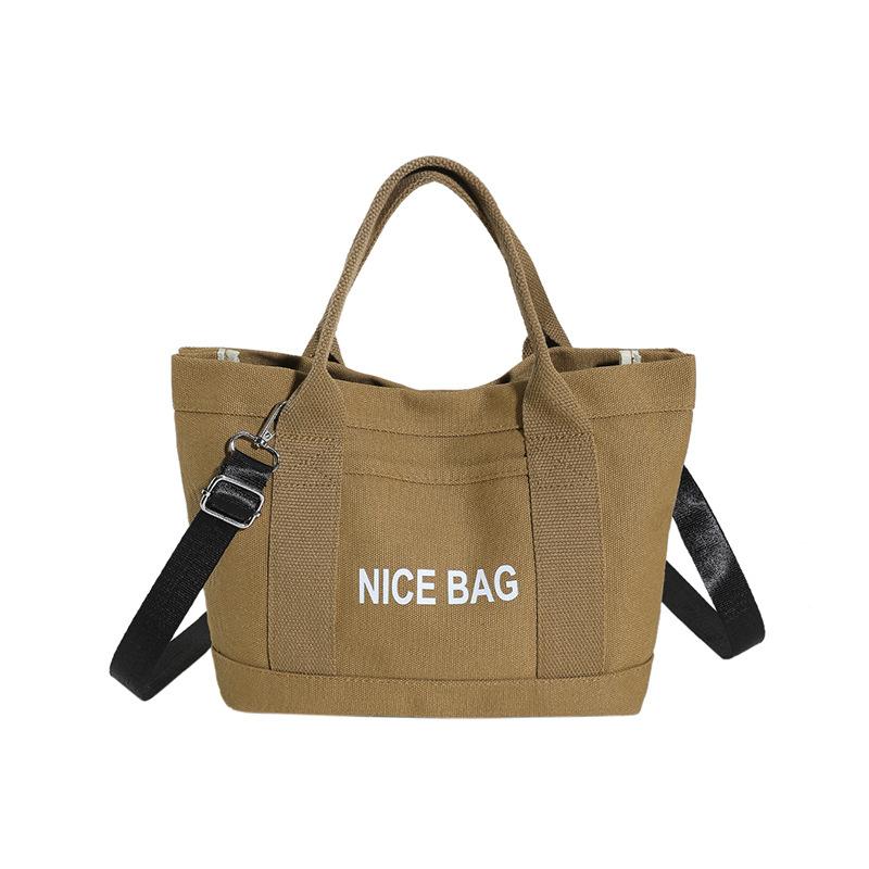 

Popular women s shoulder bag 2025 new simple retro versatile bag large capacity multi-layer portable canvas bag коричневый