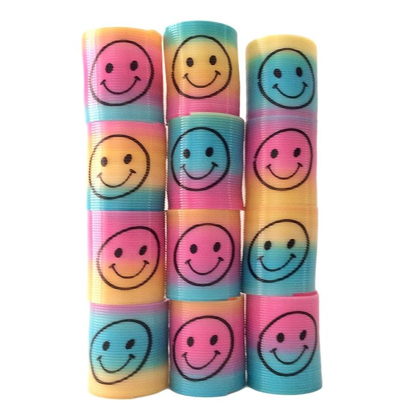 12x Mini Slinky Smiley Face Springs Rainbow Smiley Face Spring Party Bag výplně plastové