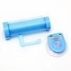 Plastic Device - A Suction Cup Press for Convenient Storage and Uniform Squeezing of Toothpaste Tubes