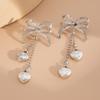 Französischer Schleifenquasten-Perlenketten-Ohrring Kreativer Silber-Gold-Farbiger Damen-Herzanhänger Lange Ohrringe Schmuckzubehör 2025