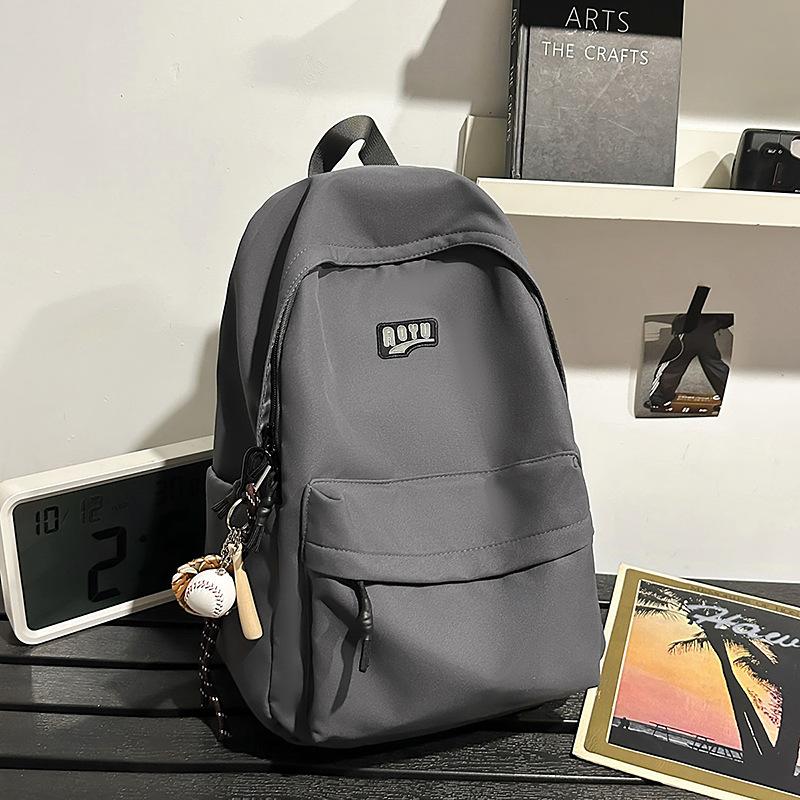 Student schoolbag Junior high school student backpack Elementary school student school large capacity high value solid color schoolbag new