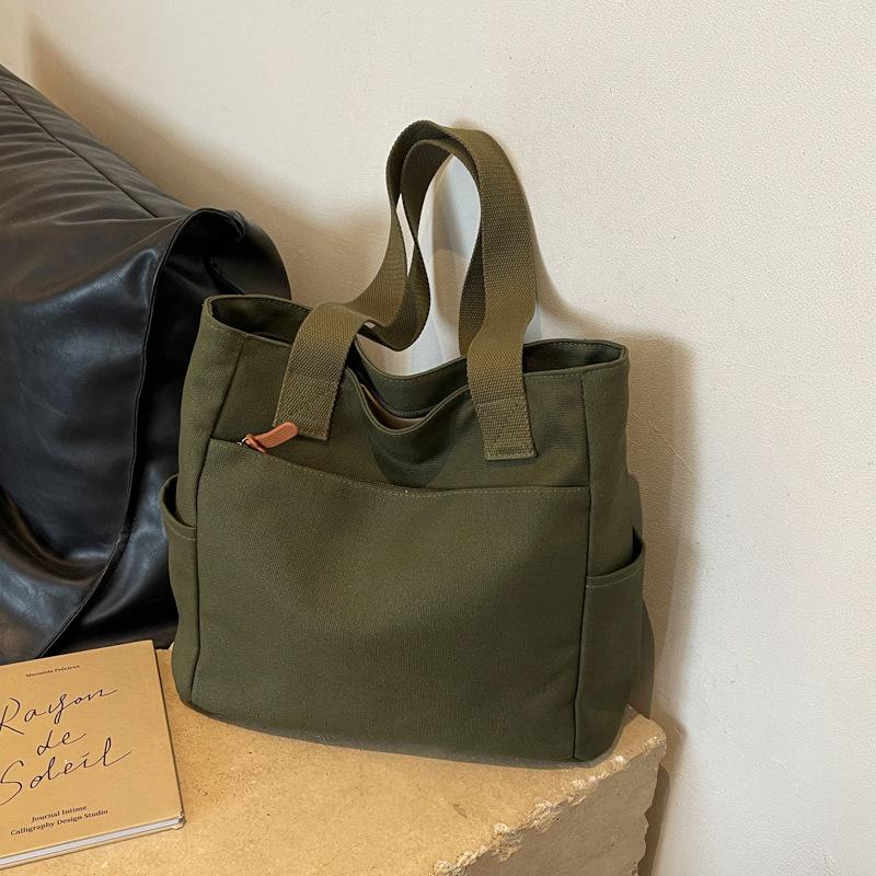

Canvas Women s Shoulder Bag Large Capacity Multiple Outer Pocket Zipper Tote Bag Student Handbag Shopping 2026 New зелений