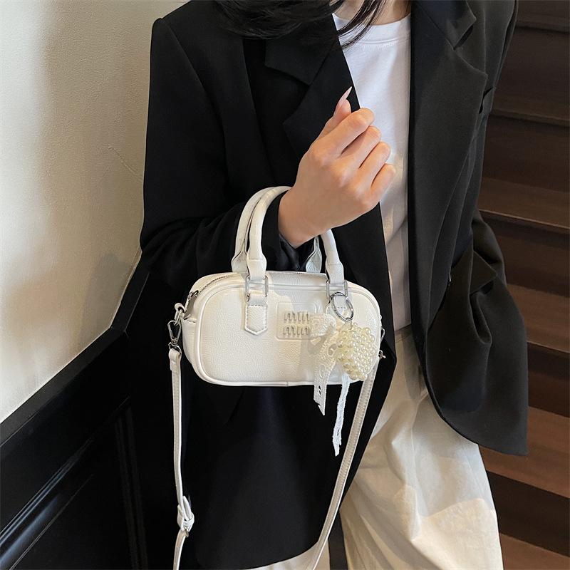 Niche casual messenger bag new fashion shoulder bag feeling hand carry bowling women's bag handbag bag