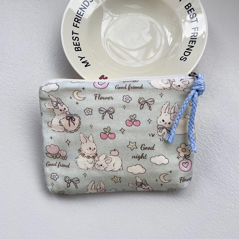 Adorable Blue Cartoon Makeup Bag: Mini Pure Cotton Coin and Earphone Pouch, Lipstick Carrier, Portable Storage.