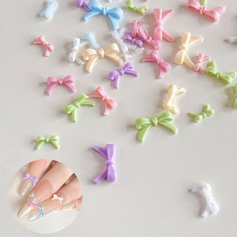 50Pcs Colorful Bow Nail Art Parts Charms Bulk Shiny Mini Resin Ribbon Nail Rhinestones Diy Summer Nail Art Decor Accessories