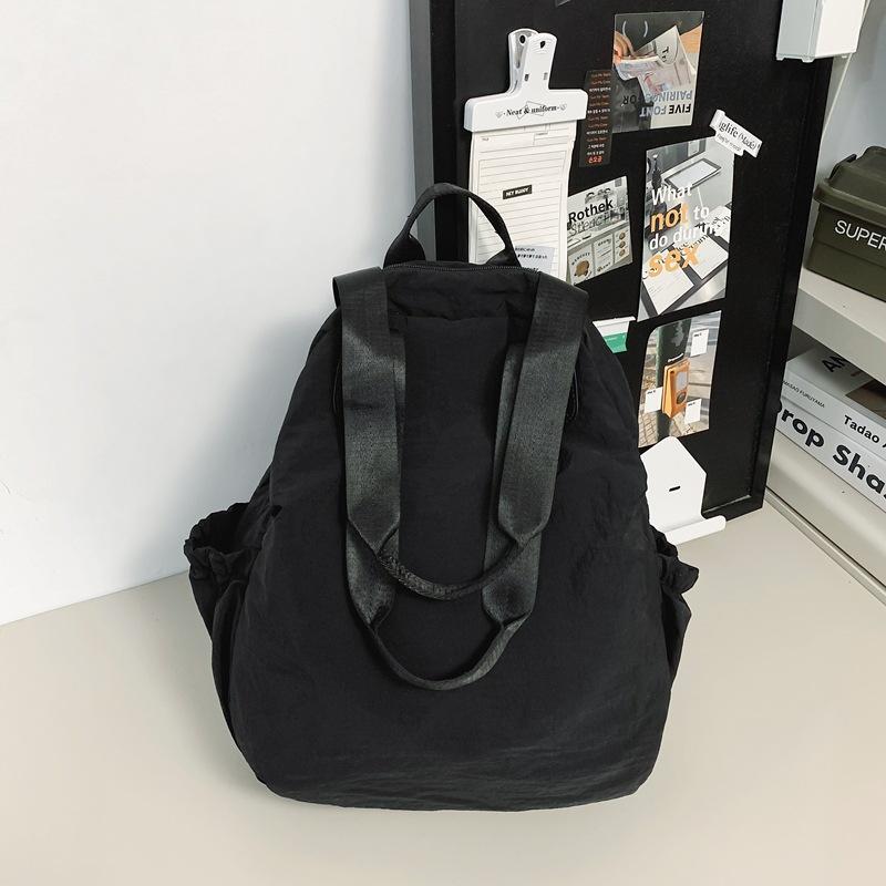 Schoolbag Korean version portable backpack female versatile leisure student make-up bag niche design shoulder bag lazy wind handbag