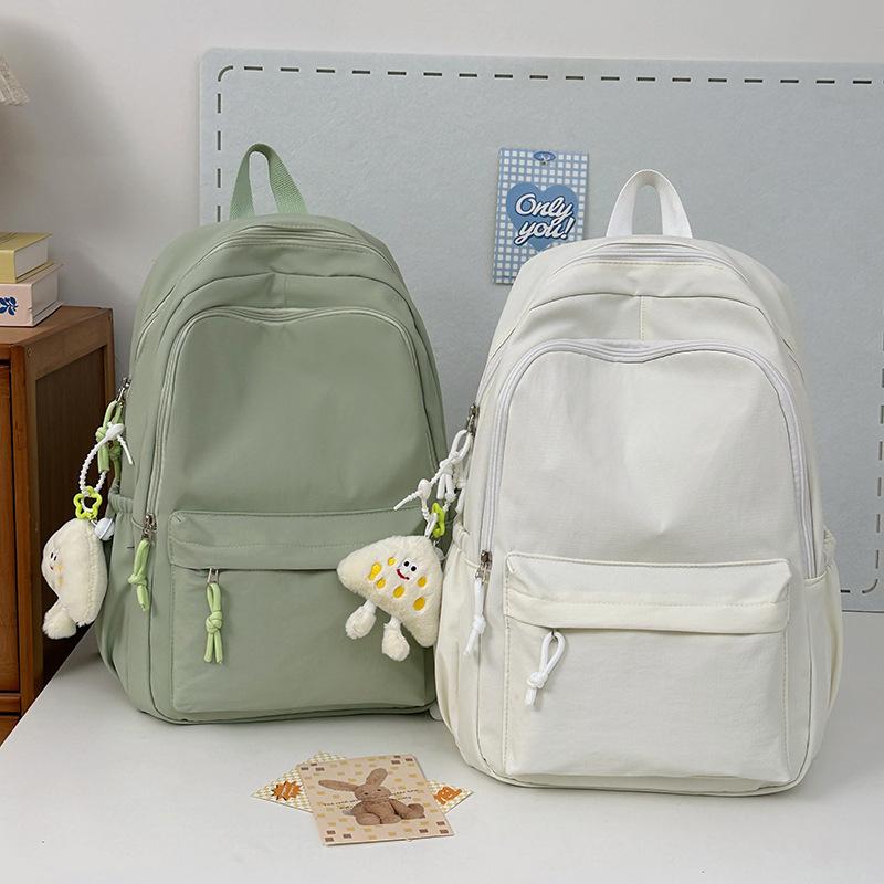 Zaino scolastico zaino da uomo semplice ad alta capacità zaino da viaggio da donna tempo libero studente scuola media giapponese studente liceo studente universitario