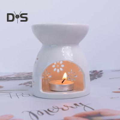 Bruciatore di oli essenziali con cucchiaio Bruciatore di aromi in ceramica bianca Scioglicera con design ritagliato Scaldacera da tavolo per camera da letto Sala di meditazione
