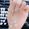 Cat's Eye Tassel Ear Chain 2024 Trend: Elegant Long Earrings with Light Luxury Design
