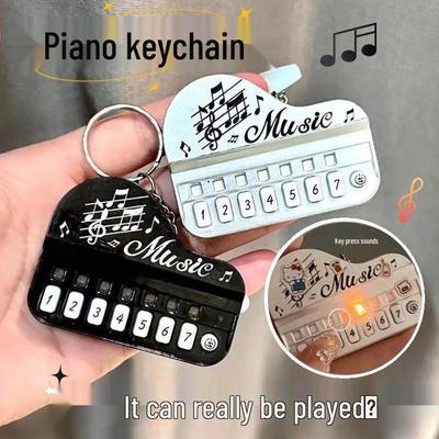 Leuchtender Spielzeugklavier-Schlüsselanhänger: Mini Kinder-Elektronik-Keyboard Videospielkonsole