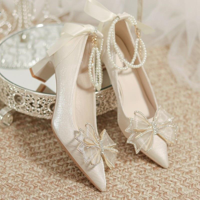 High heels women's summer 2025 new high-end pointed head bow wedding shoes rhinestone beaded shallow mouth single shoes women
