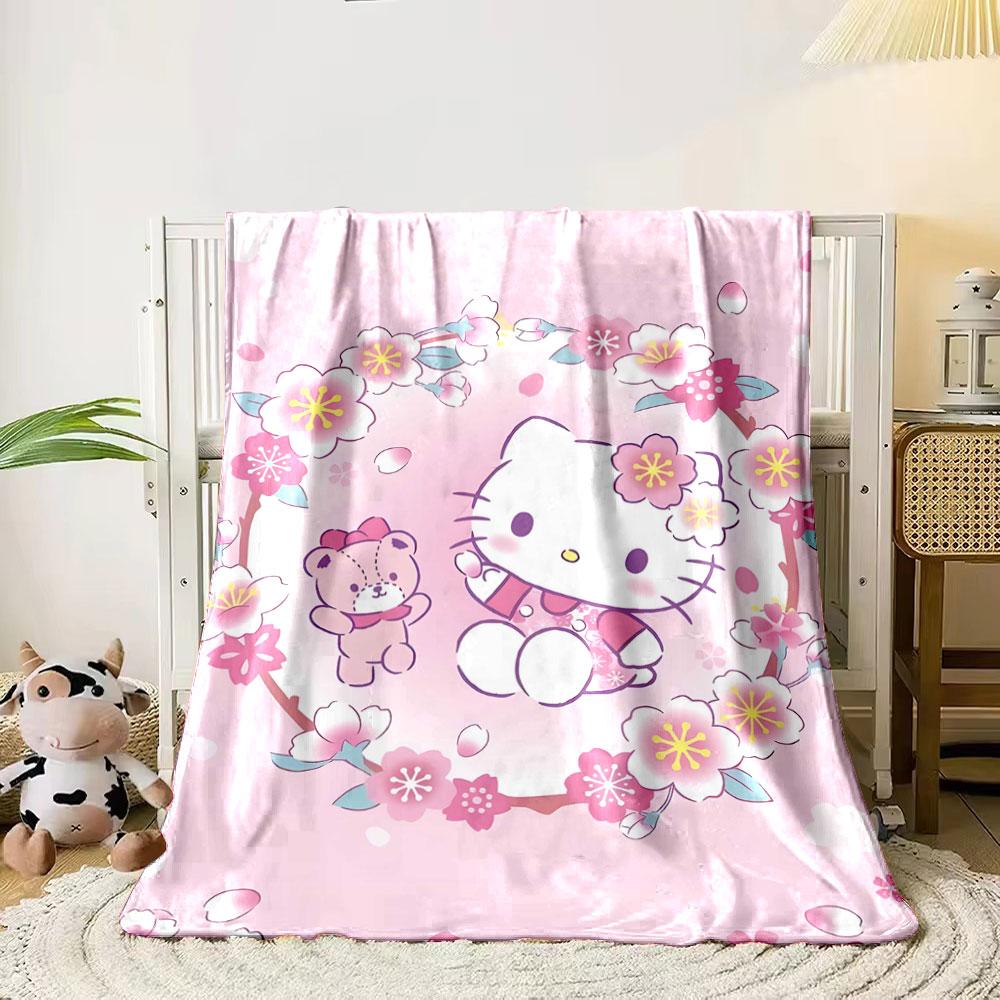 

Cherry blossoms encircle cartoon characters on a pastel pink background. for all seasons blanket lunch break throw gift 80cm x 120cm