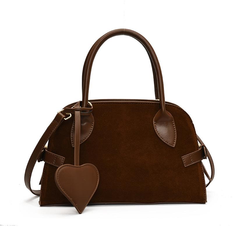 

Сумка в стиле ретро с леопардовым принтом для женщин, простая и универсальная, сумка-мешок Niche Light Luxury Messenger через плечо 28.5*9*18