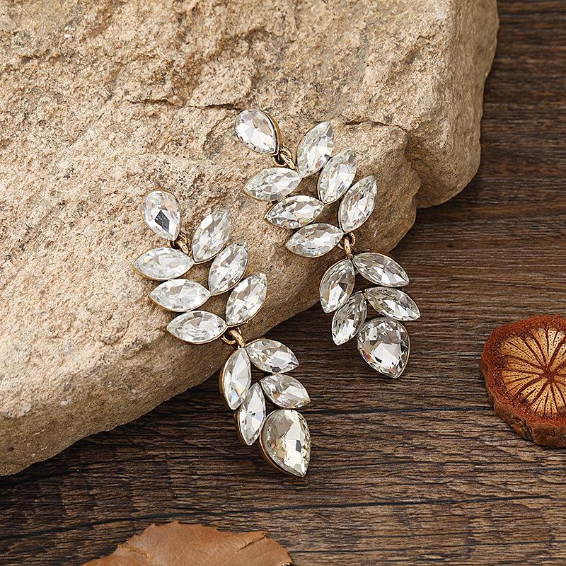 Creative Fashion Earrings - European & American Hollow Leaf Design with Diamonds for Women