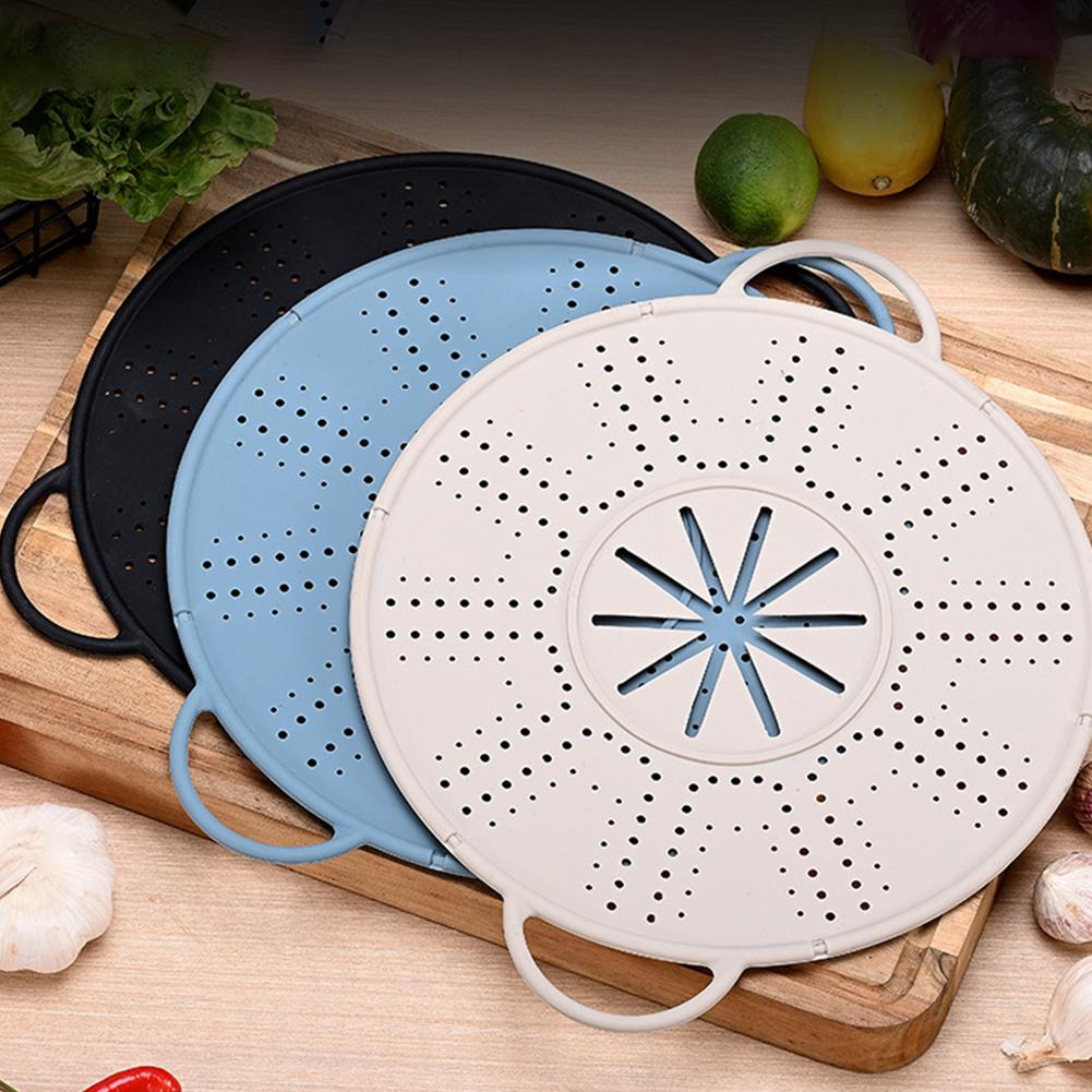 Easily Storeable Silicone Pot Holder That Doubles As a Spill Stopper Tool