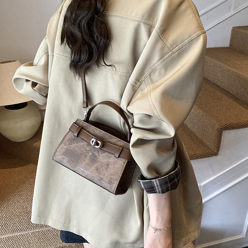 Crossbody bag women's new high-end fashion versatile hand bag niche popular shoulder bucket bag