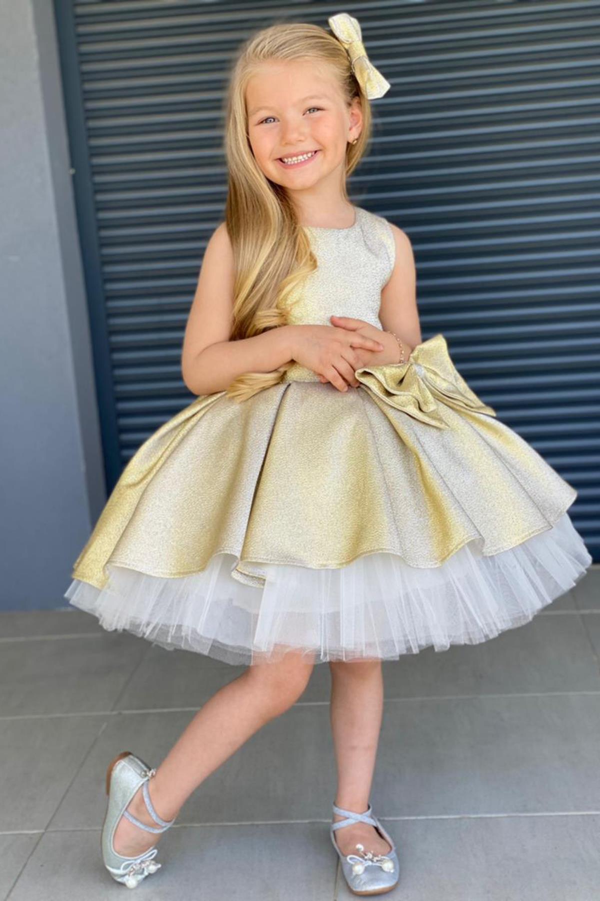 

Girl s Ribbon Detail on Waist, Tulle Detail in Skirt, Glittery Yellow Evening Dress 2-10 Years