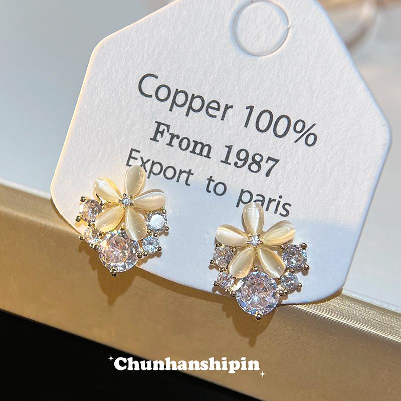opal flower ear clips without ear piercings, high-end sense, niche fresh earrings, commuting versatile, simple temperament, mosquito coil disc