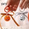 Pumpkin Bell Keychain with Bow Halloween Keychain, Hollow Head Key Ring Ribbon Bow, Backpacks Charm for Holiday Party Decoration Creepy